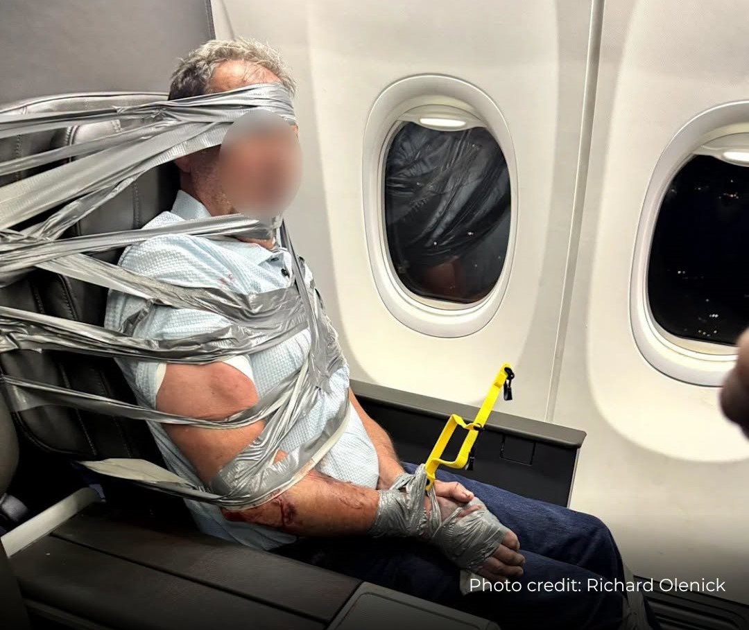 Passenger duct-taped to seat as American Airlines flight diverts to Baltimore after mid-air outburst turns violent